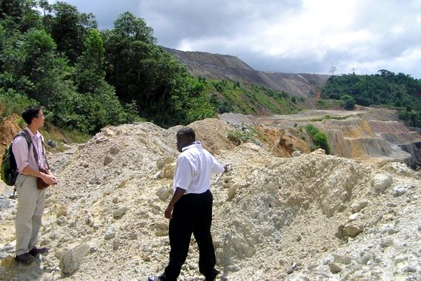 Melvin Huang (left), a Clinic student, visits one of the open-pit mines in Ghana in 2009.