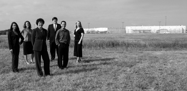 Farheen Jan, ’08, Elise Harriger, ’08, Immigration Clinic Director and Clinical Professor Barbara Hines, Matt Pizzo, ’08, Clinic Administrator Eduardo Maraboto, and Kate Lincoln-Goldfinch, ’08, outside the Hutto facility in Taylor, Texas.