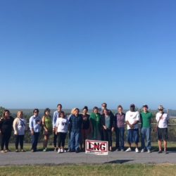 Group photo of students standing outside
