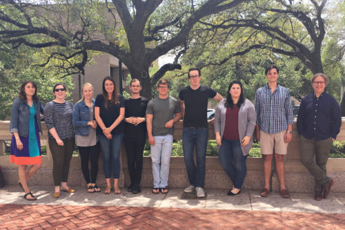 Actual Innocence Clinic students and faculty stand in front of the law school.