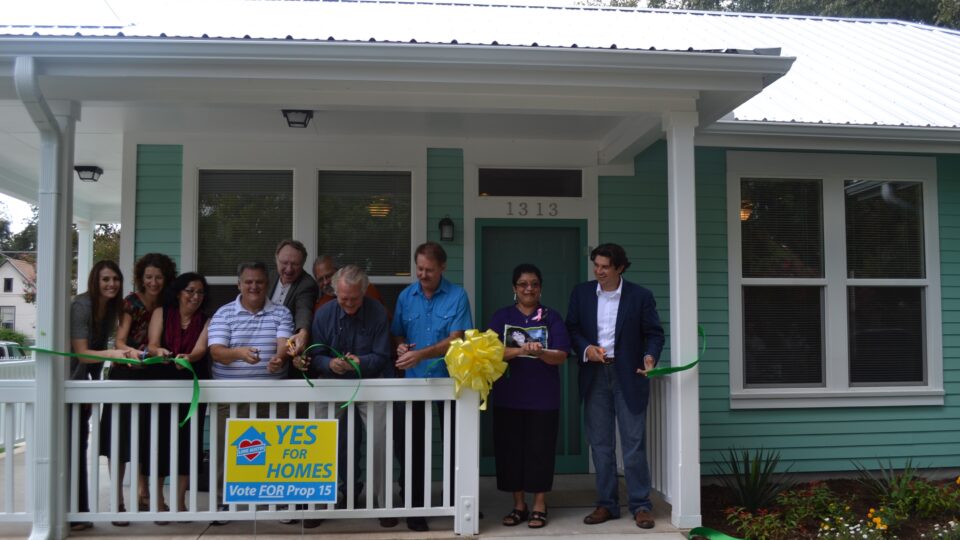 Community members attend a ribbon cutting event