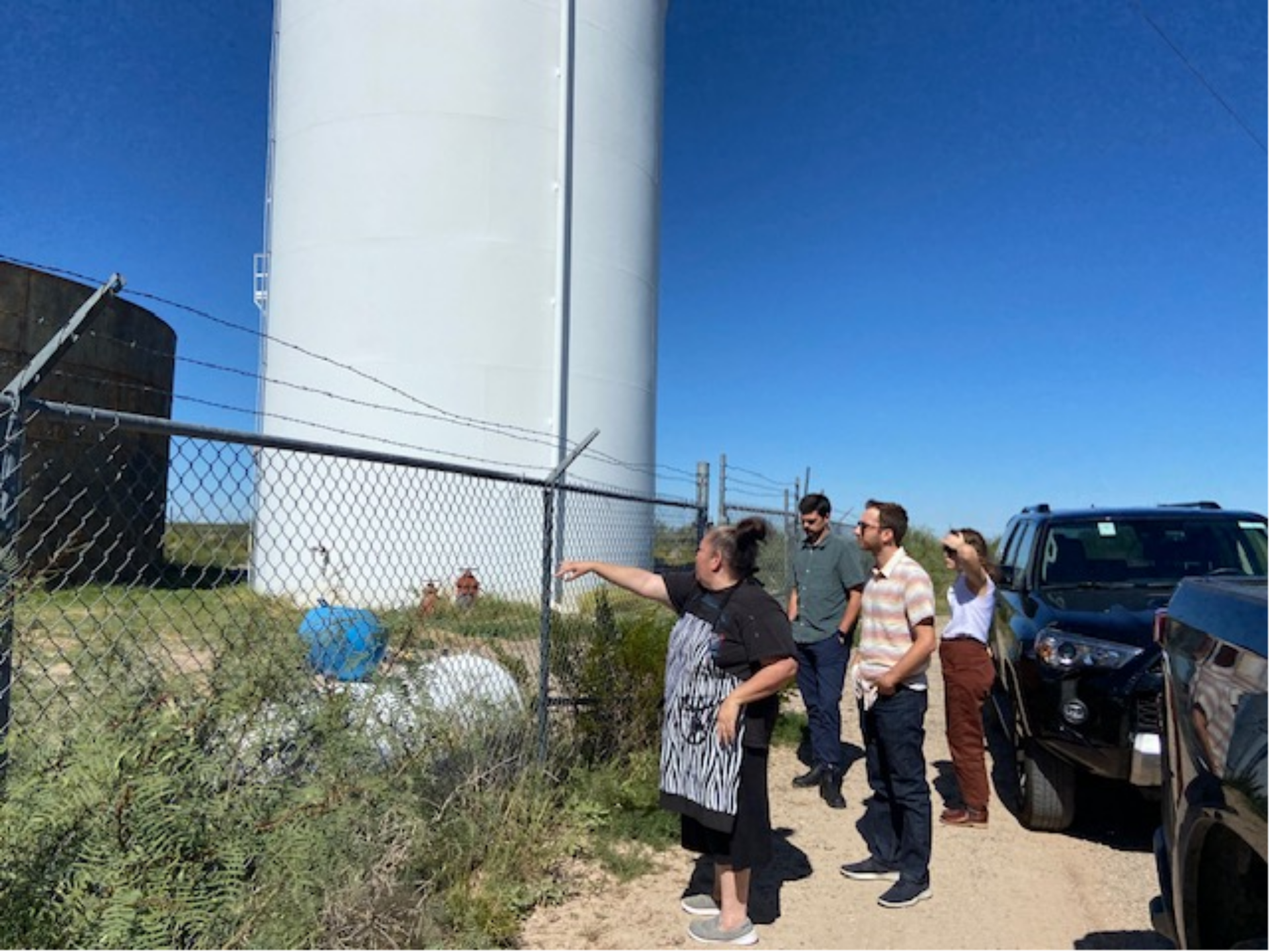 Clinic students and client examine water treatment facility in Toyah, TX.