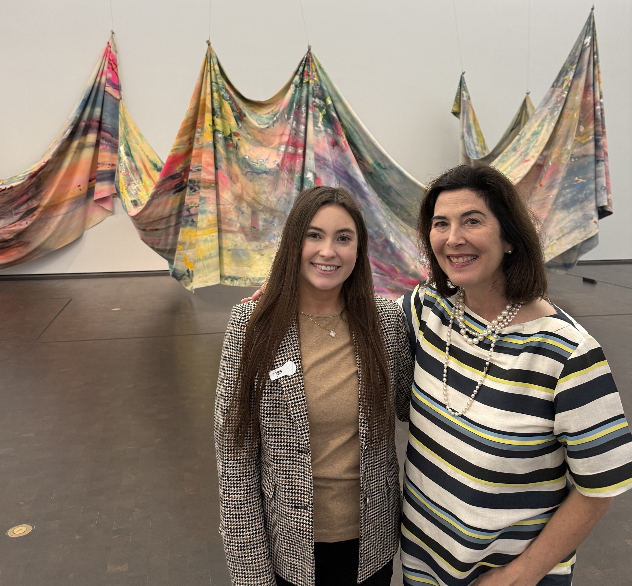 Internship students stands with her supervisor