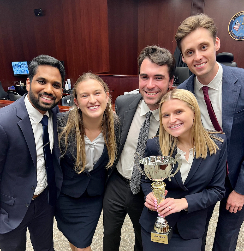 Texas Law team champions of the 2023 Georgetown White Collar Crime Invitational show their trophy