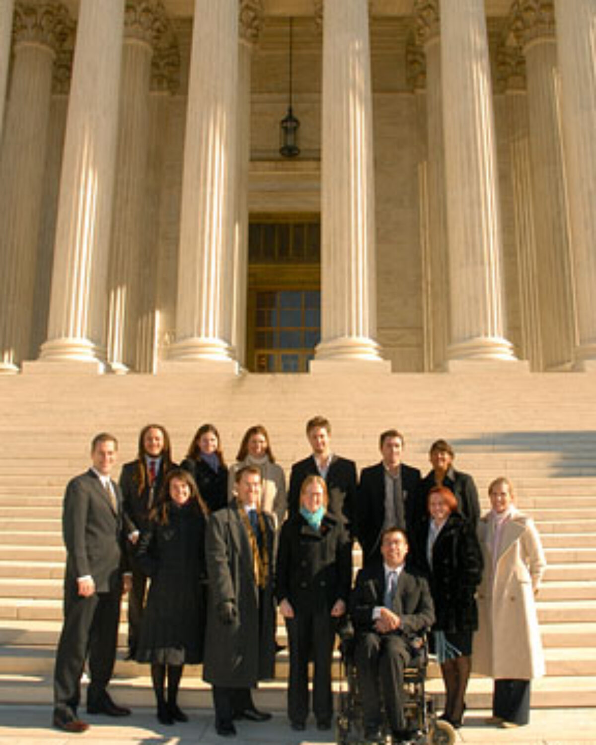 Members of Capital Punishment Clinic on steps of U.S. Supreme Court Building