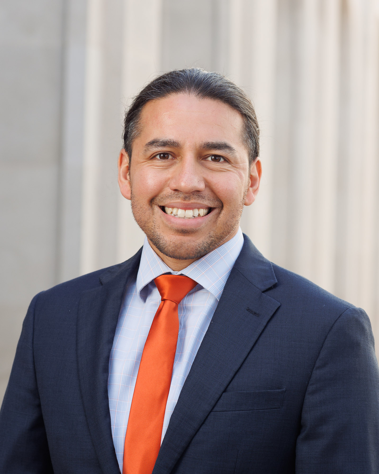 Portrait of Michael Morales wearing suit and tie