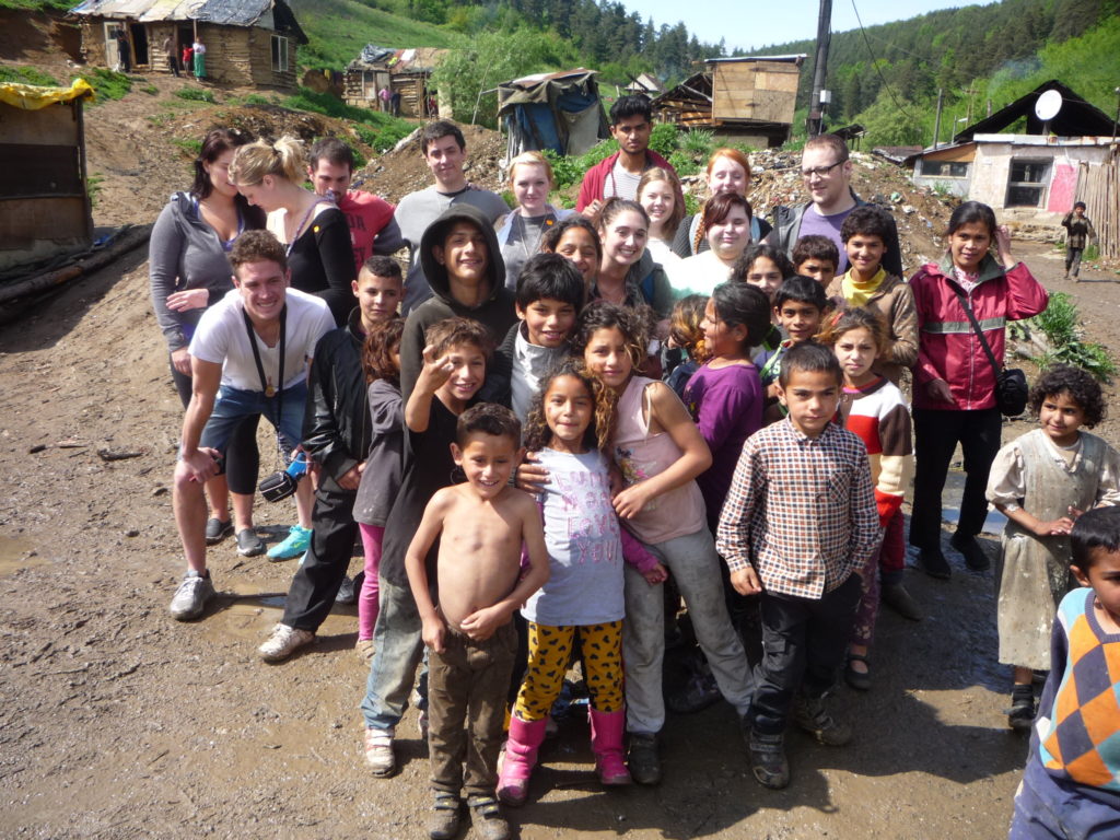 Romani children pose for a photograph