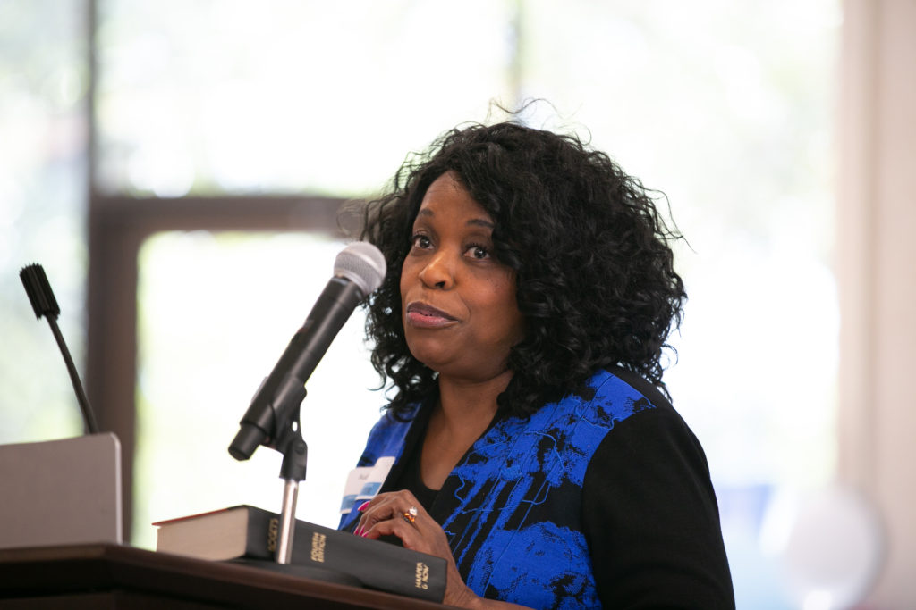 Photo of Audrey Selden speaking at podium