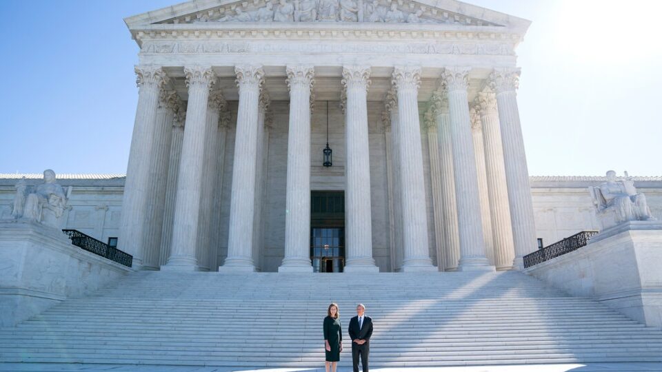 Justice Amy Coney Barrett and Chief Justice John Roberts at the Supreme Court on Friday