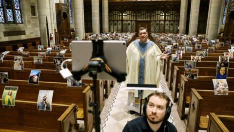 A priest live-streaming a church service during COVID-19