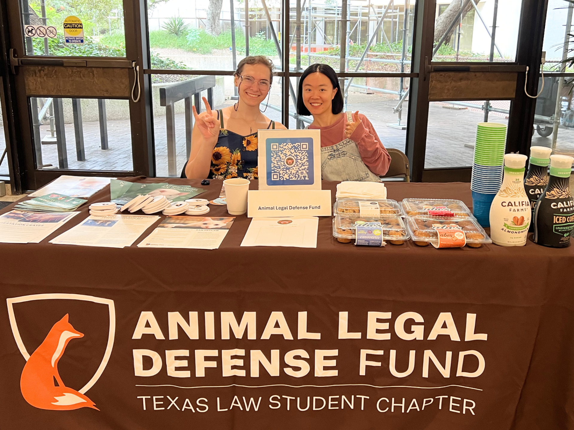 Two students at informational table