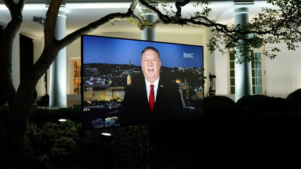 Mike Pompeo on a television screen in front of the White House