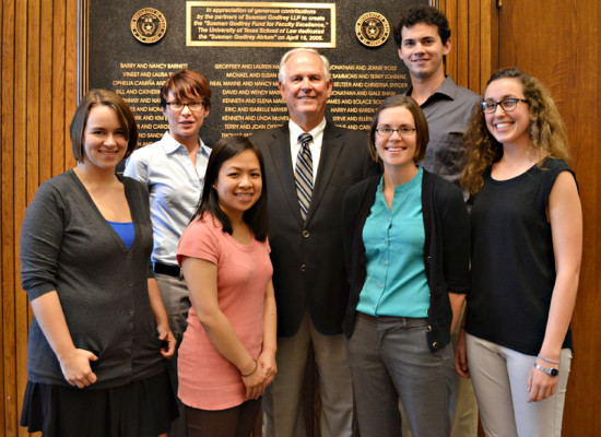 Bill Whitehurst, '70, (center) stands with the 2013 Whitehurst Public Interest Summer Fellows, left to right, (l-r) Mackenzie Meador, ’14; Cassandra McCrae, ’14; Stephanie Trinh, ’14; Mary Chisolm Rios, ’14; Daniel Smith, ’14; and Sofia Meissner, ‘15