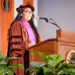 Jessica Cisneros, Texas Law Class of 2018, speaking at the 2018 Latinx Graduation
