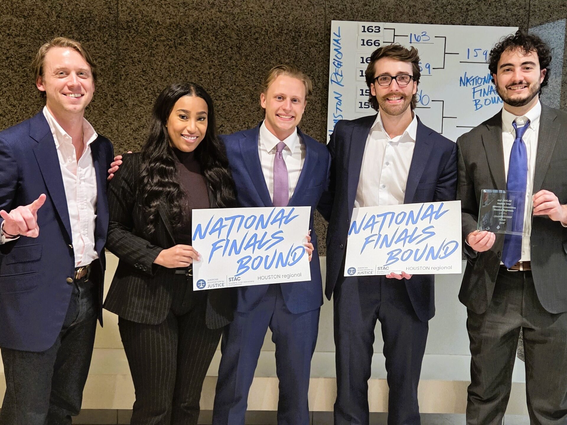 Photo of Ryan Ziminskas, Raychel Polk, Jack Rabinowitz, Tyler Merkley, and Michael Blaine at the AAJ Student Trial Advocacy Competition