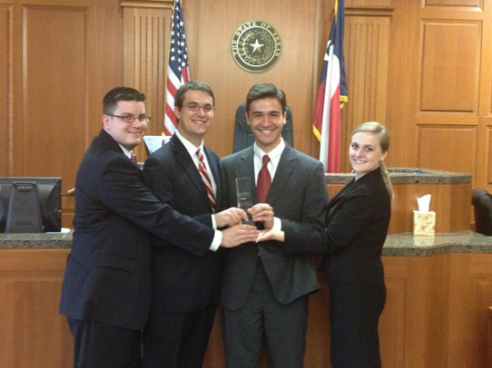Third-year students, from left to right, Brandon Montminy, Stephen Green, Coulter Goodman, and Colleen Bloss won the regional round of the American Association for Justice’s Student Trial Advocacy Competition, and will head to New Orleans, Louisiana, to compete for a national championship in April. 