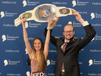 Texas Federalist Society members hold up their award