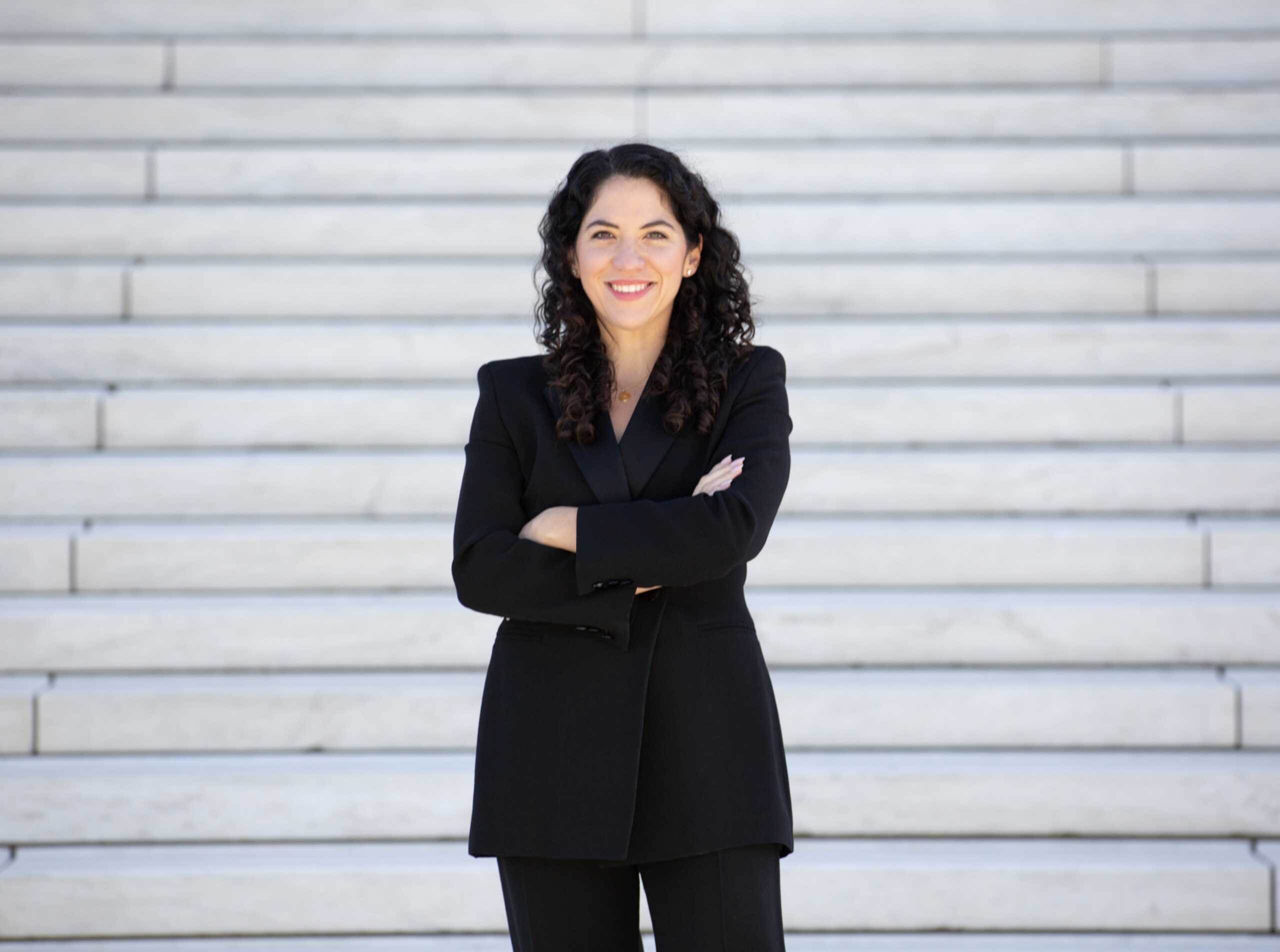 Alejandra Ávila '14, on the steps of the U.S. Supreme Court