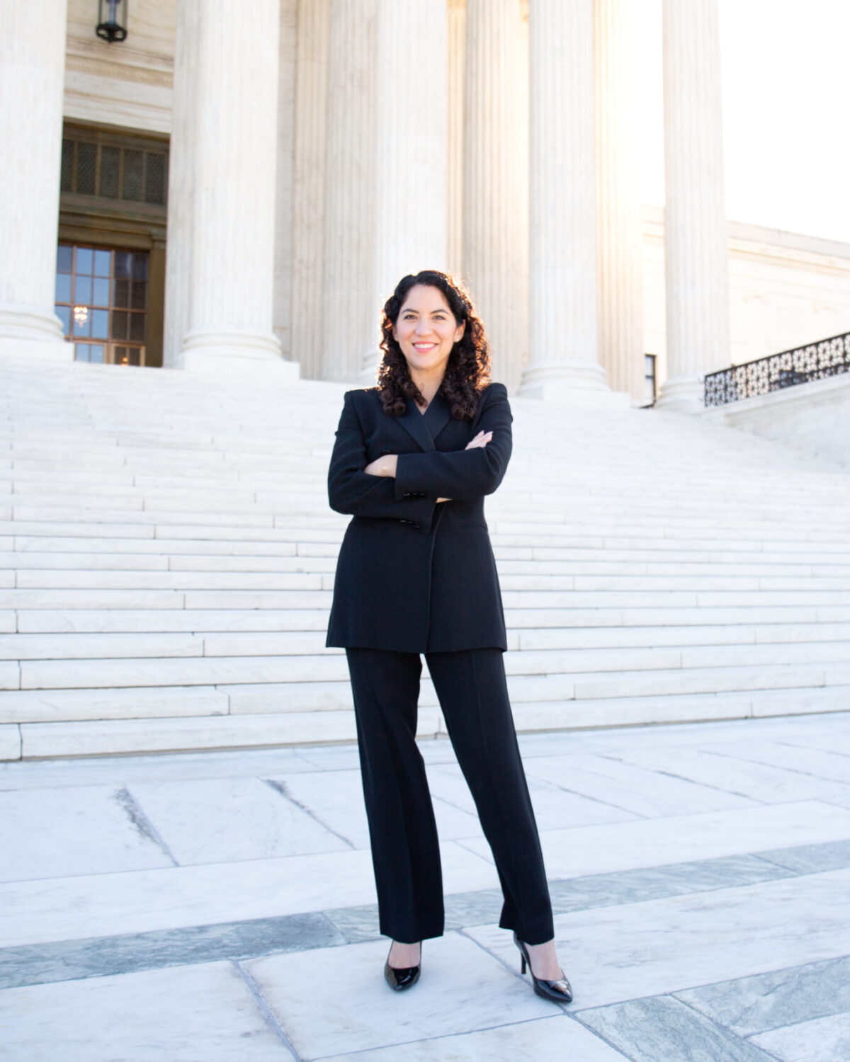 Alejandra Ávila stands on the steps of the U.S. Supreme Court