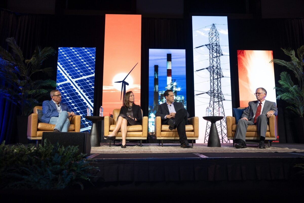 During a panel, journalists who write about energy discuss their interactions with sources and others who work in the industry.