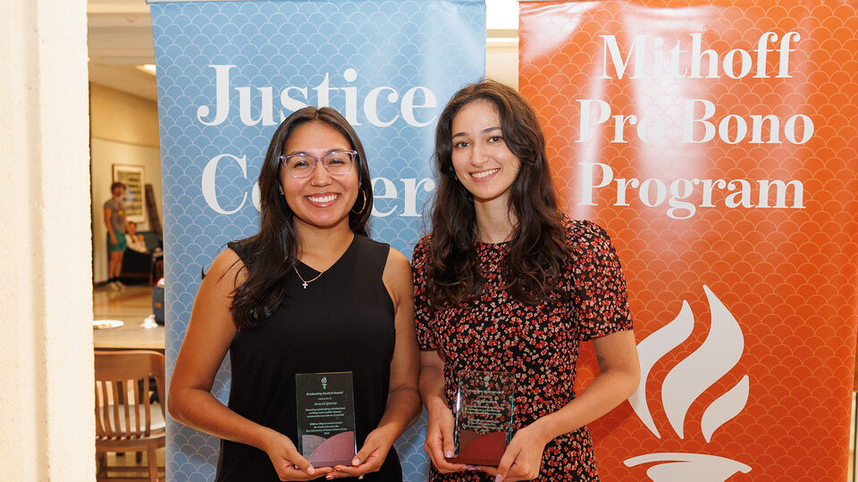 Araceli Garcia and Amy Austern hold their trophies