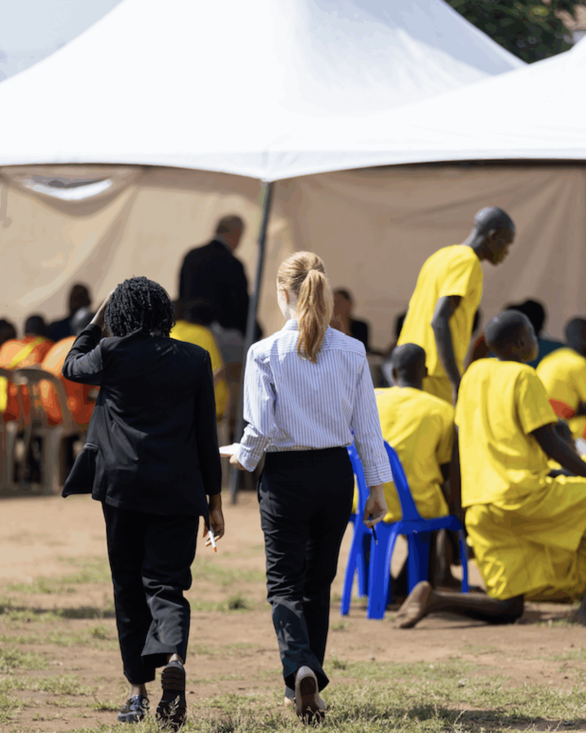 Cassidy Winters ’27 chatting with an intern in Gulu, Uganda