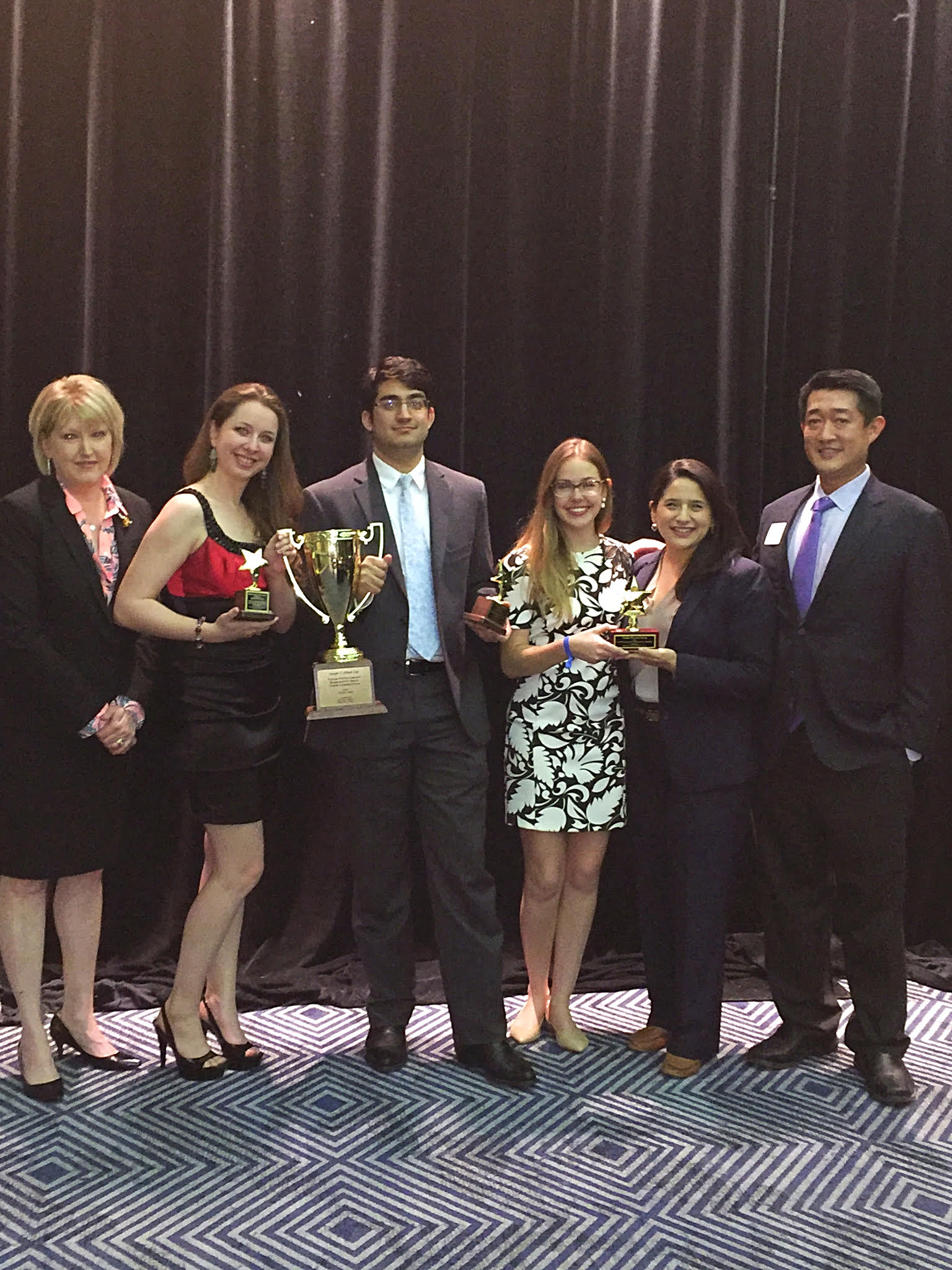 Elliot cup team with trophies