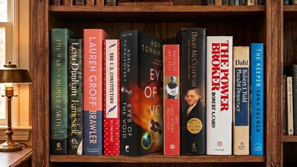 An image of books selected by Texas Law faculty sitting on a bookshelf, generated by Gemini.