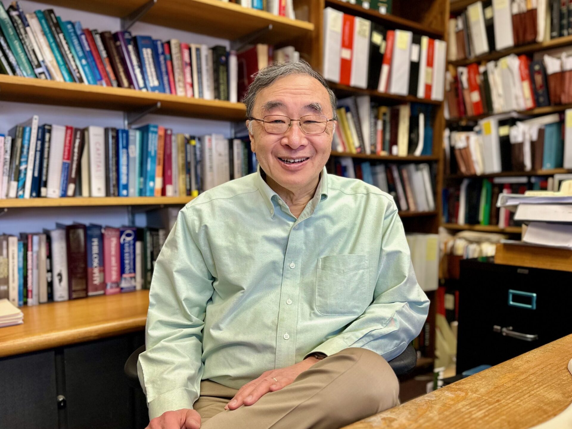 Portrait of Prof. Henry Hu in his office