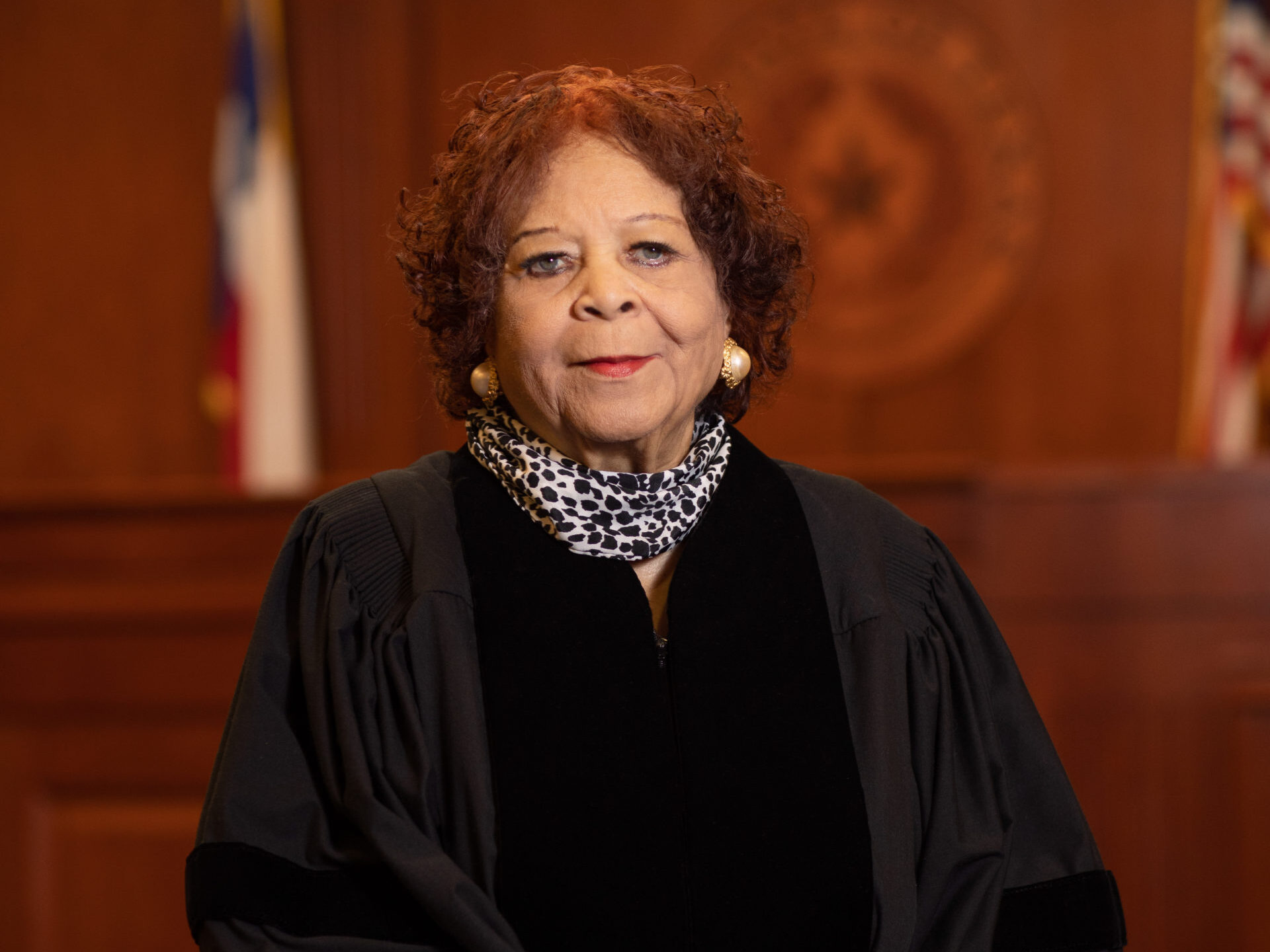 Judge Harriet Murphy posing in a courtroom