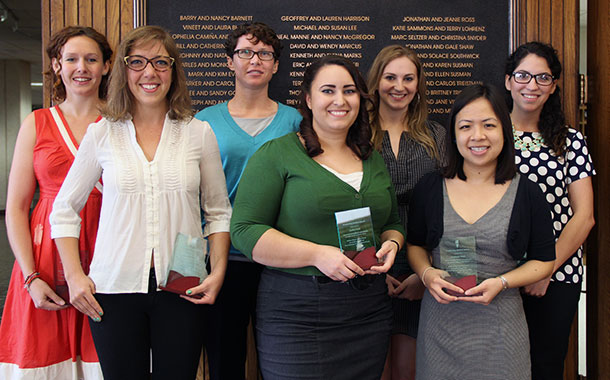 Seven members of the Class of 2014 pose with awards received from the William Wayne Justice Center for Public Interest Law