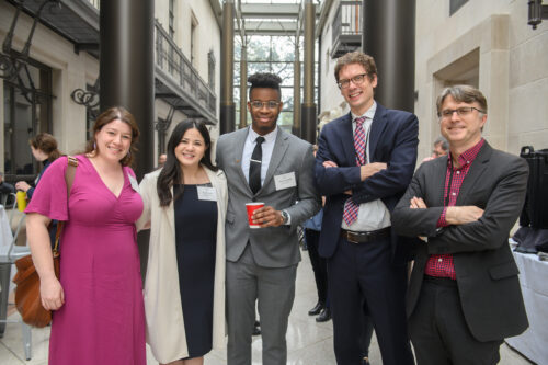 Texas Law Review students with symposium attendees