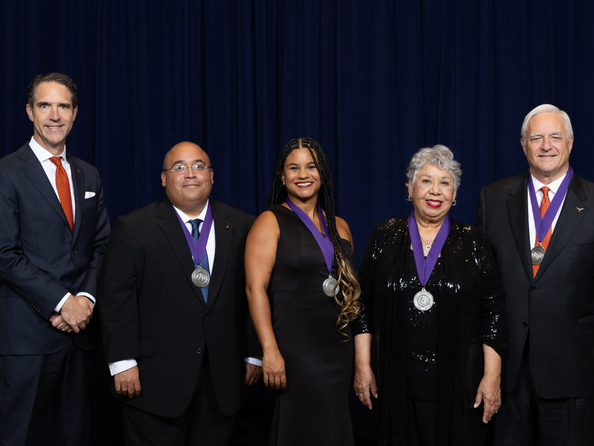 Dean Bobby Chesney, Elliott Fontenette ’09, Paige Duggins-Clay ’17, Judge Hilda Tagle Knebel ’77, and Talmage Boston ’78.