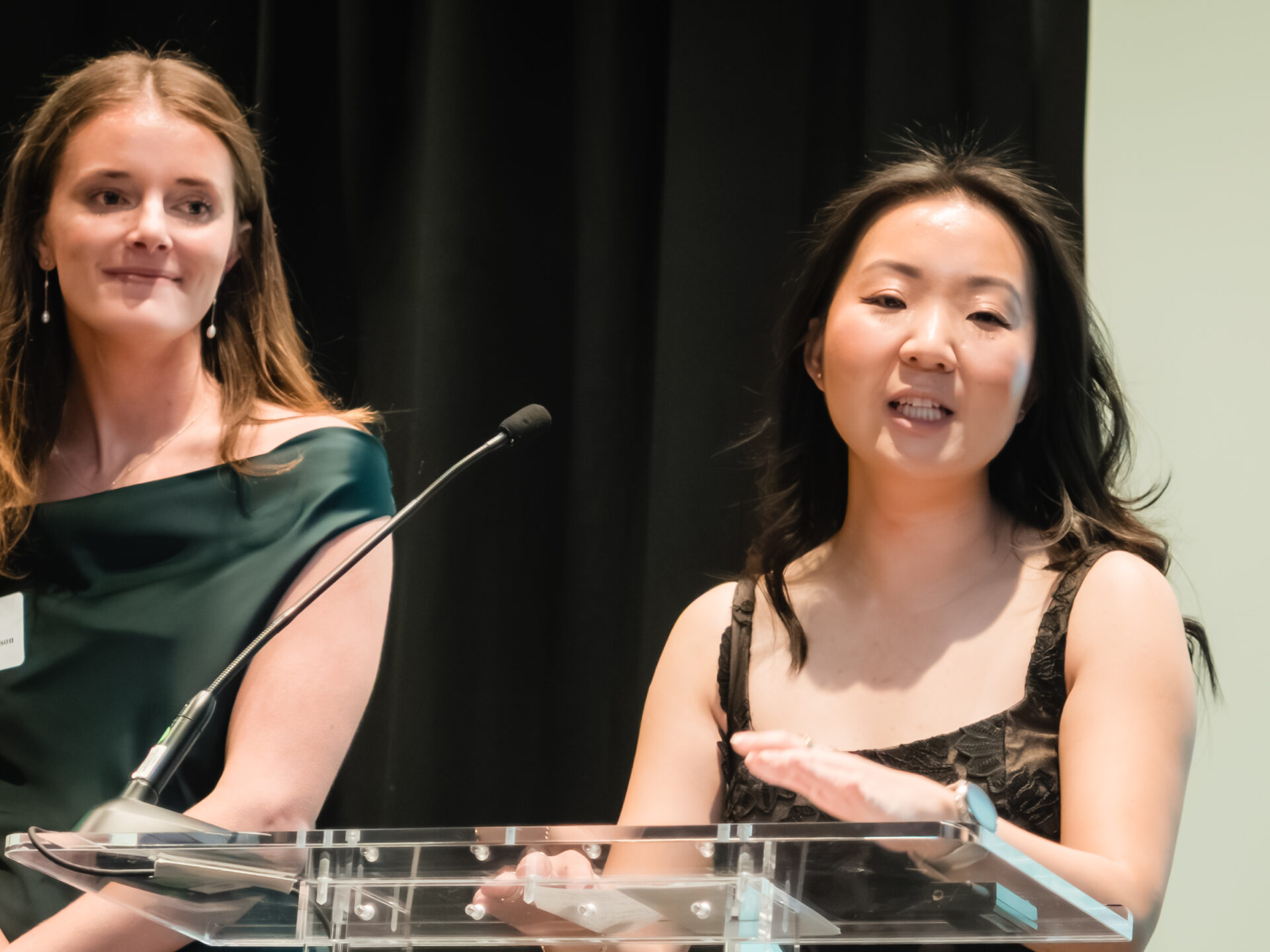 Lily presenting student awards honoring outstanding members of Texas Law Review, Volume 104, at the annual banquet.