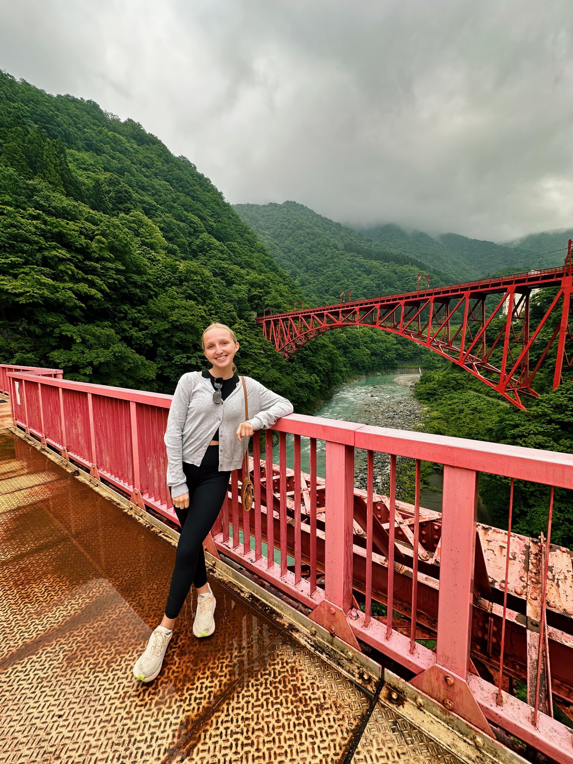 Madison Russell on a bridge in Korobe Gorge, Toyama, Japan