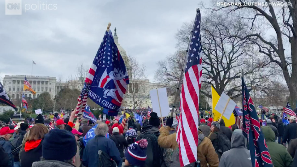 Trump flags and American flags flying as rioters stormed the capitol on January 6th.