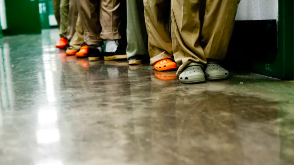 The feet of inmates inside a Texas prison