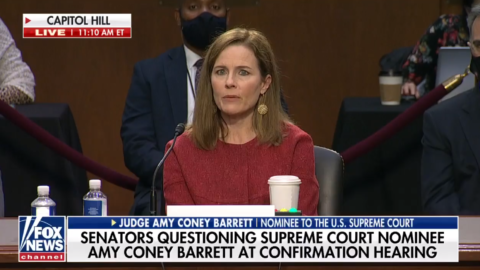 Still from Fox News segment on Amy Coney Barrett, as she is seated at a desk during the confirmation hearing.
