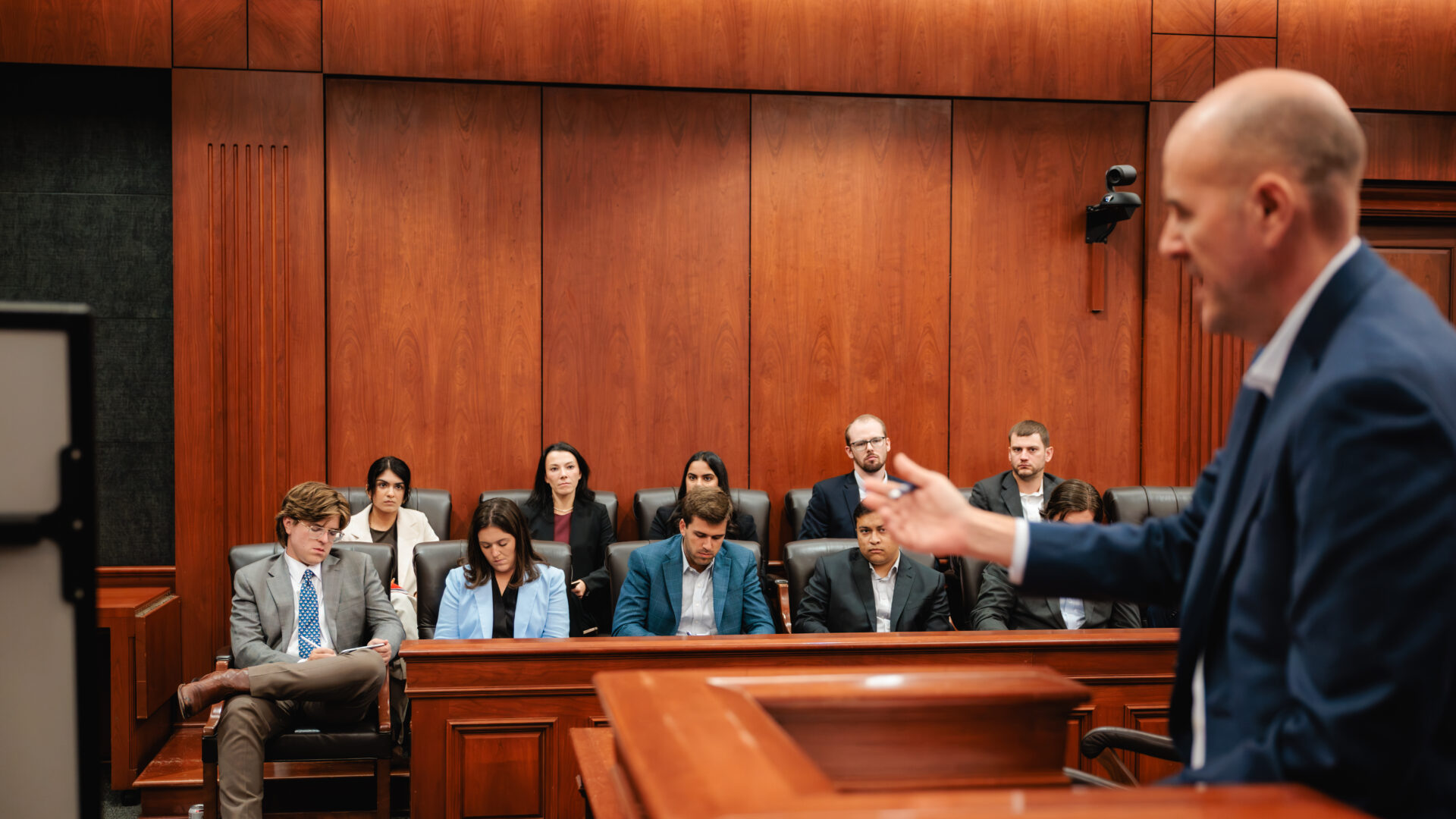 Law and Religion Clinic students observe Richard Salgado, pro bono co-counsel, demonstrate witness cross-examination.