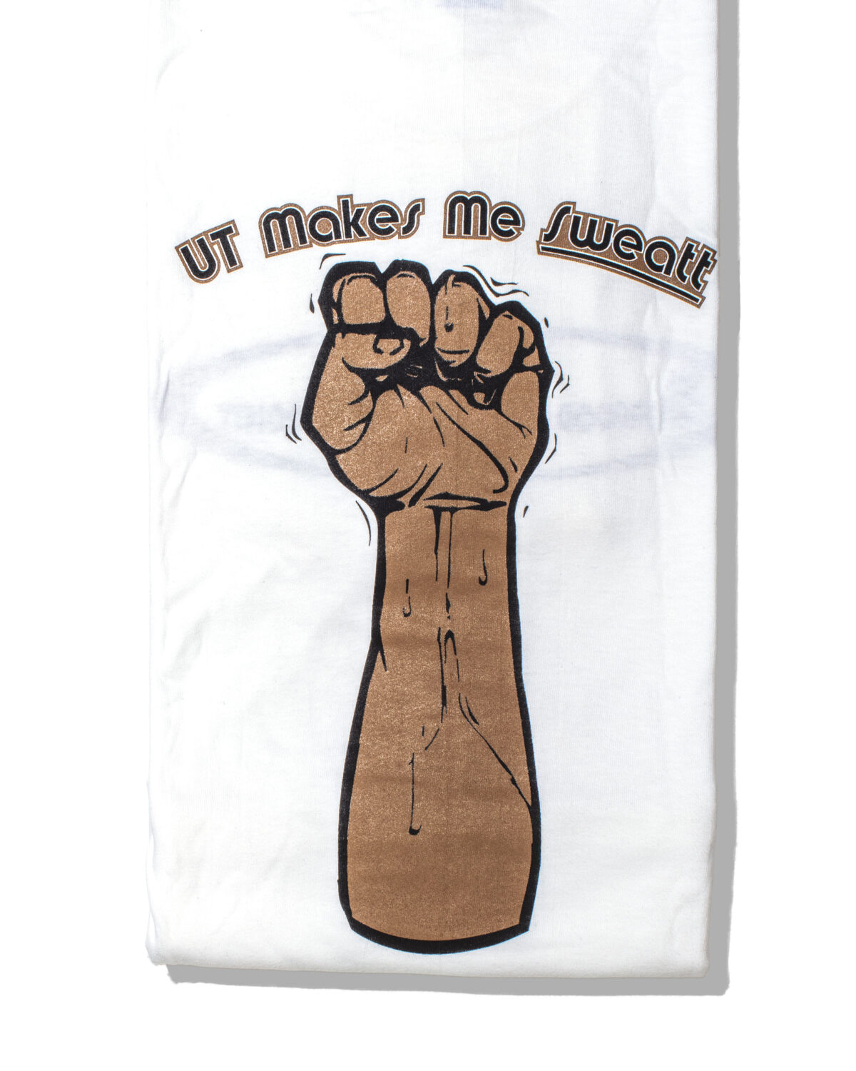 A t-shirt that reads "UT Makes Me Sweatt."