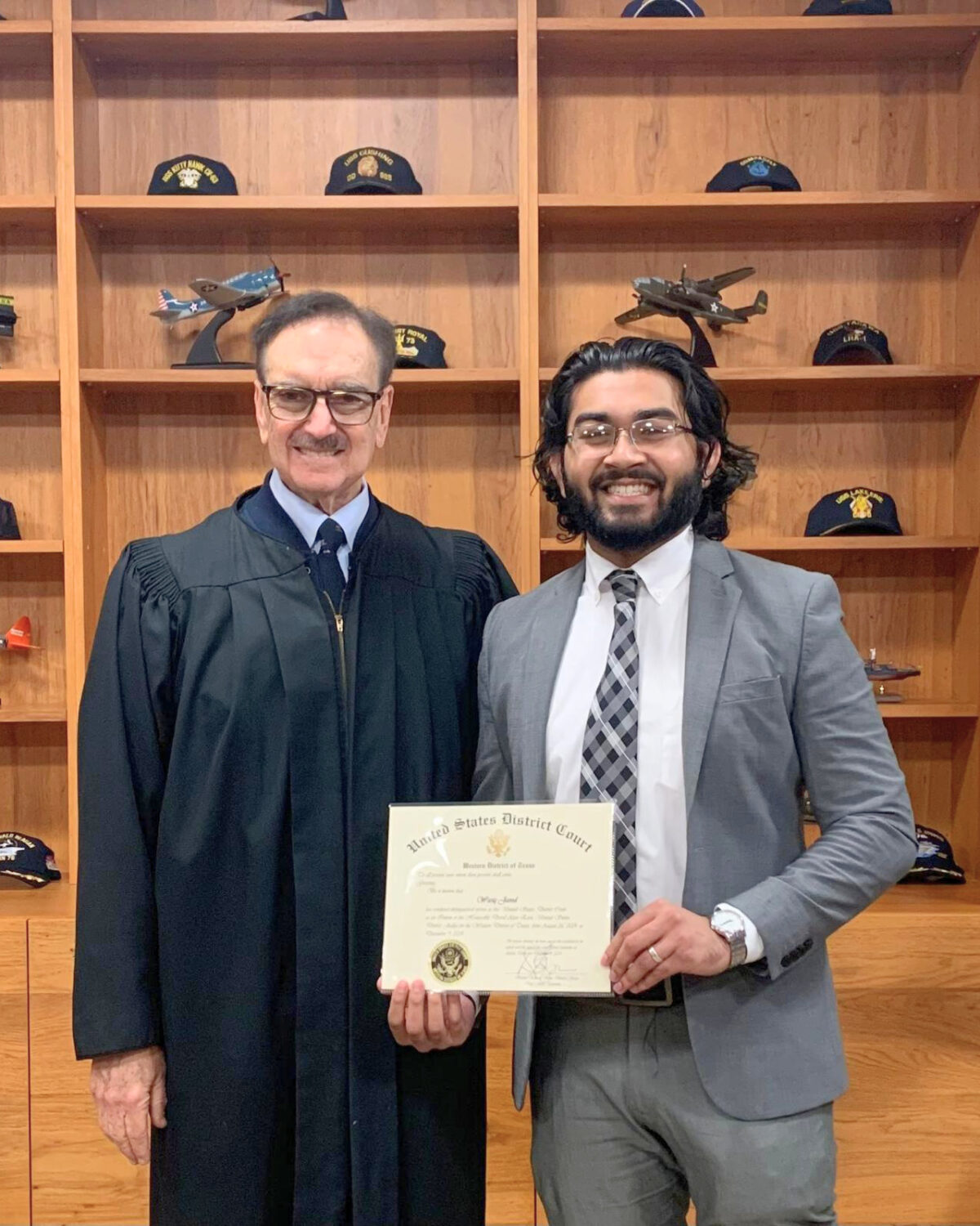 Wasiq Javed with U.S. District Judge David A. Ezra