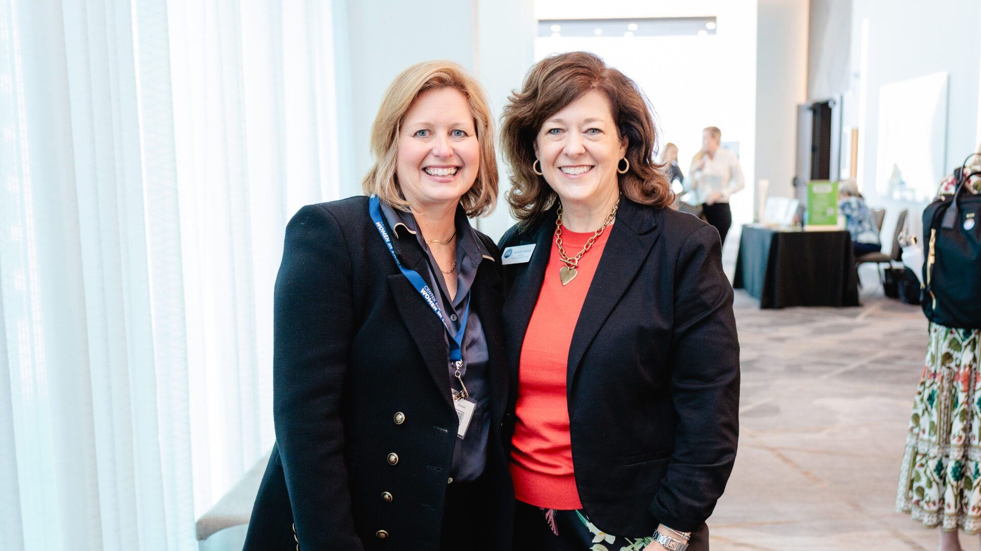 Photo of Jennifer Banda with ’98 Texas Law classmate Karen Gantt at the Women's Power Summit 2026.