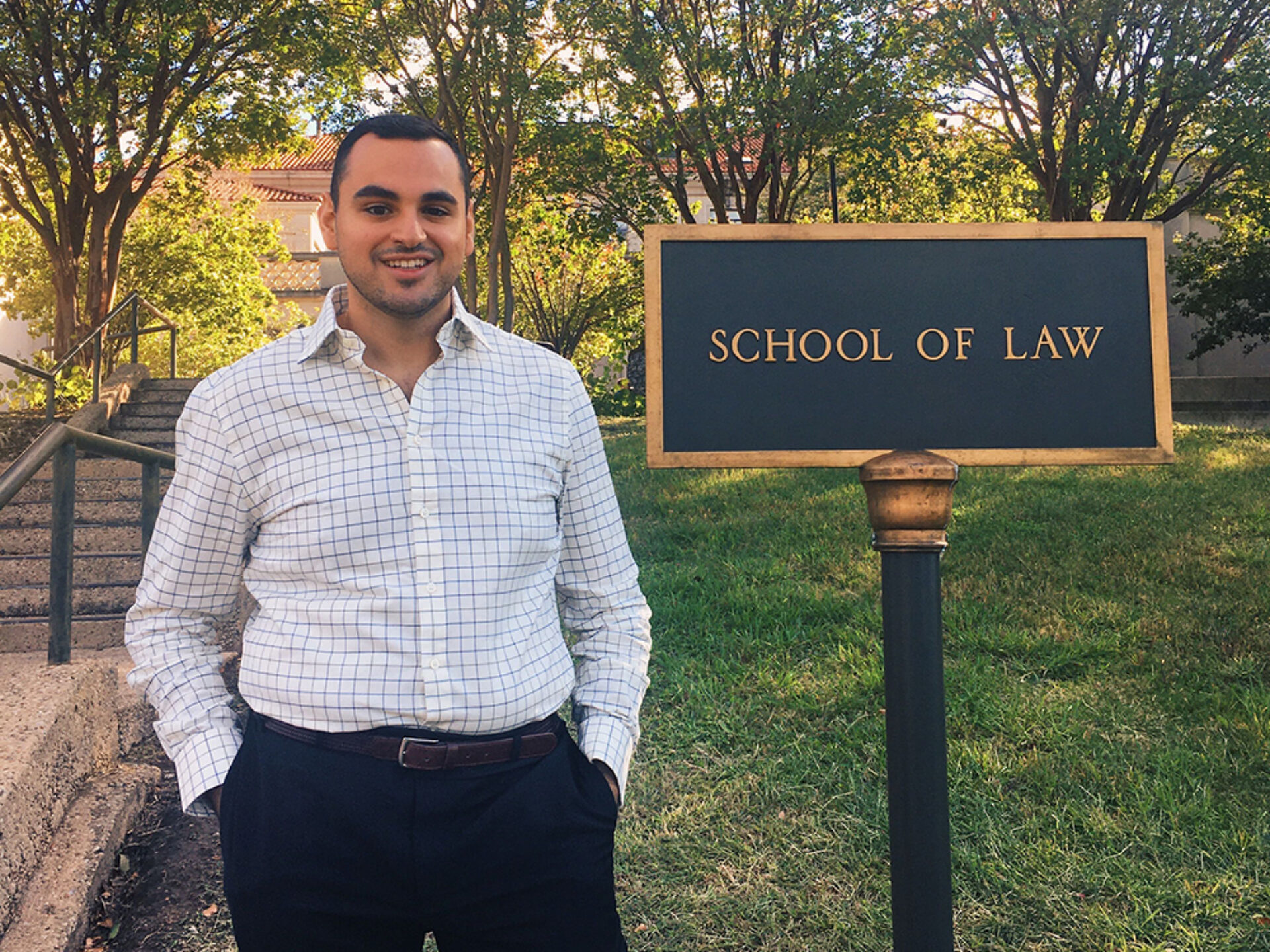 William Zakhary, pictured in front of the School of Law sign.