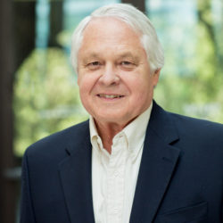 Portrait of Prof. David Anderson, wearing a white shirt and a navy jacket.