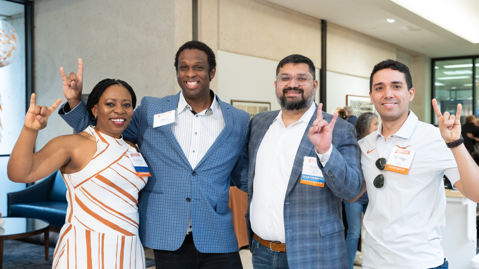 Photo of 4 alumni at the 2023 Texas Law Alumni Reunion Weekend