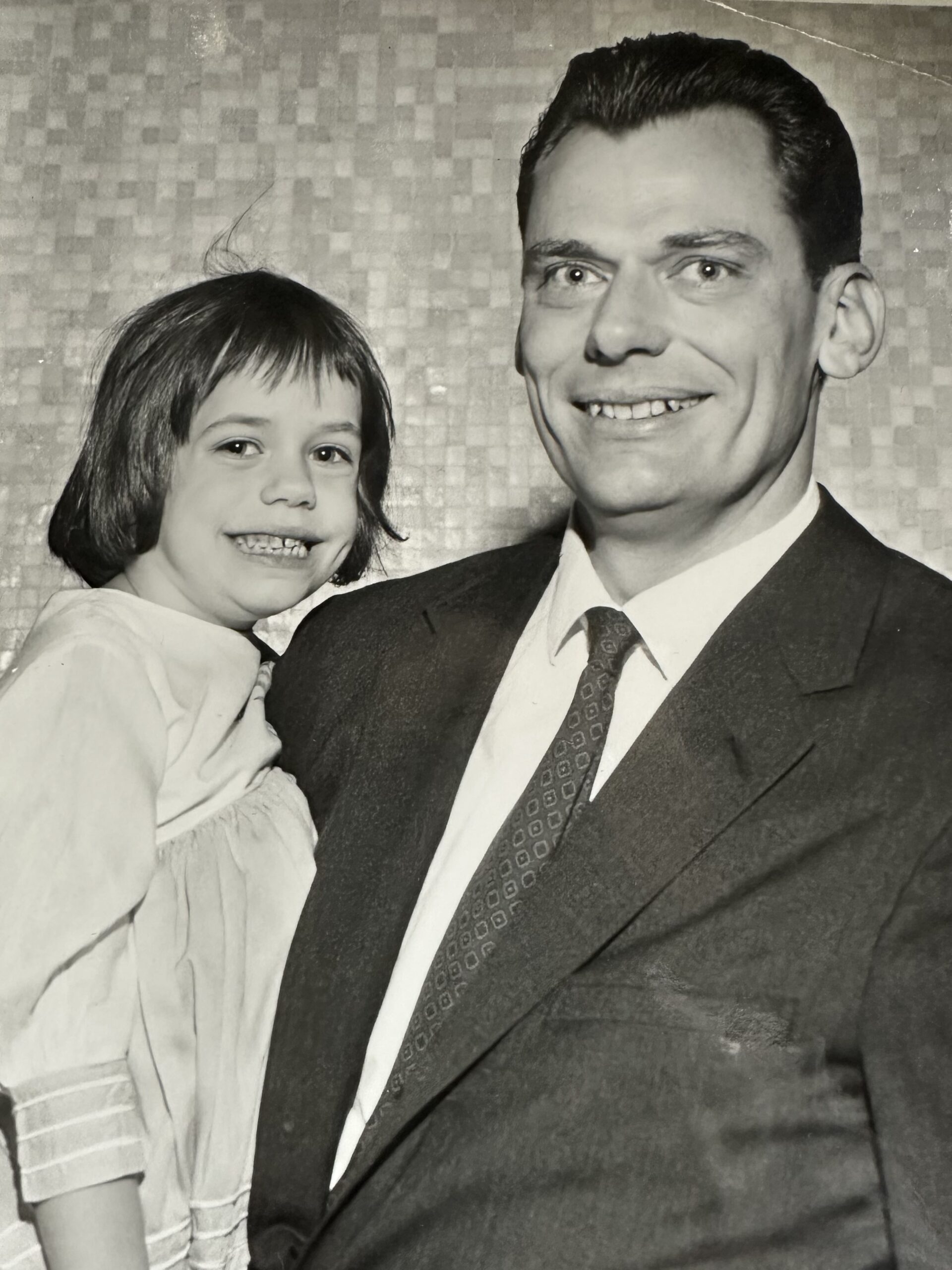 Herb Kelleher holding his daughter Ruth Agather.