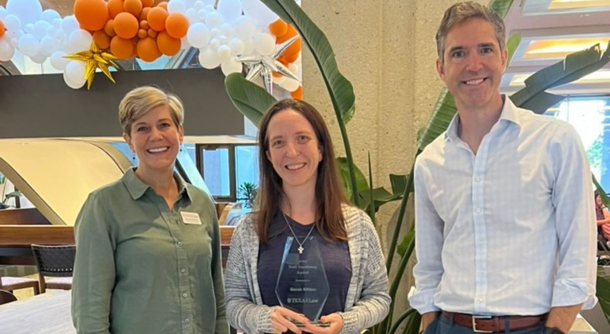 Photo of 2025 Employee of the Year Sarah Kitten with Melinda Heidenreich and Dean Bobby Chesney