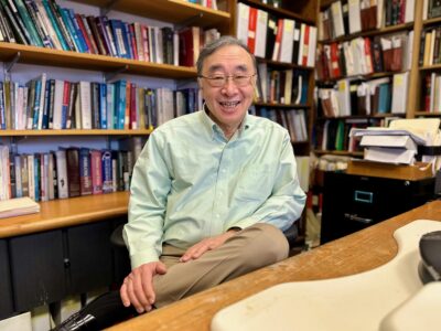 Portrait of Professor Henry Hu in his office