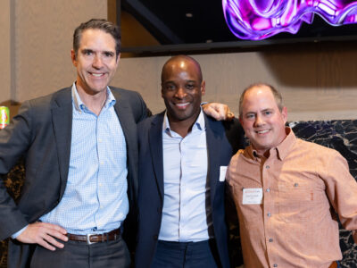 Photo of Dean Bobby Chesney, Eliot Cotton ’10, and Sam Zabaneh ’99