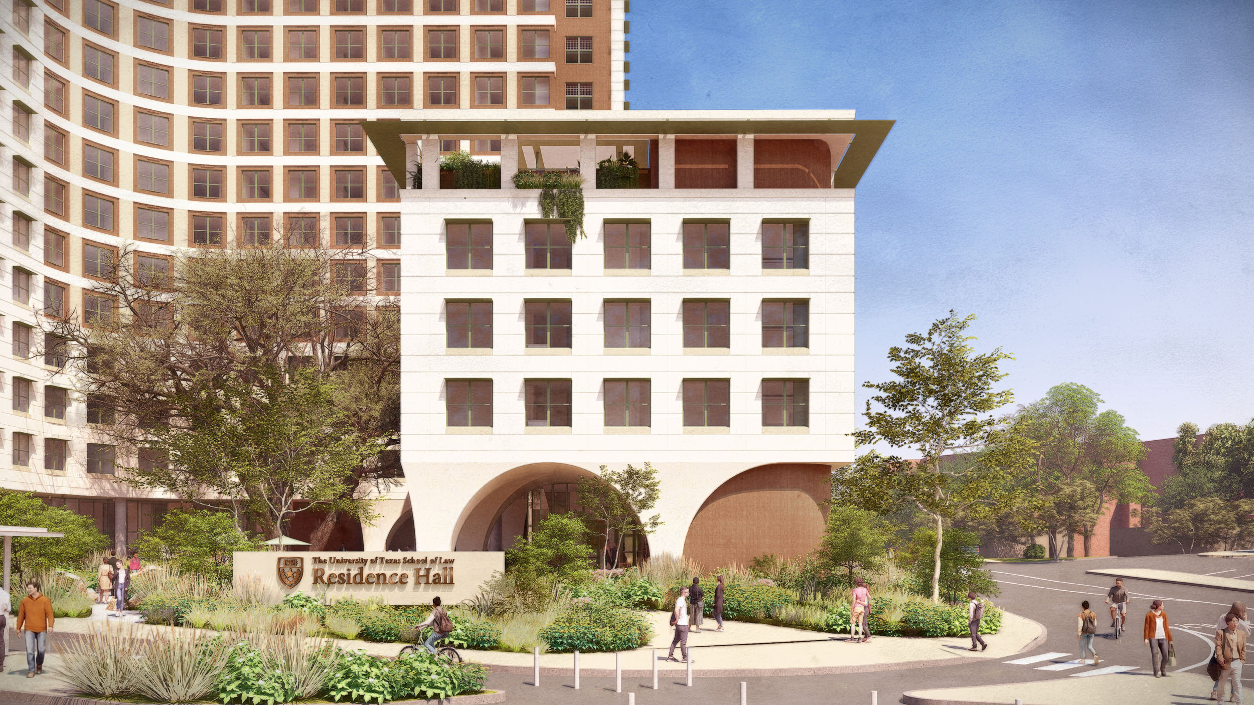 Close up front entrance of the 5 story Dean Keeton tower. Students walk and bike through a landscaped plaza with arched entries and a green rooftop terrace above.
